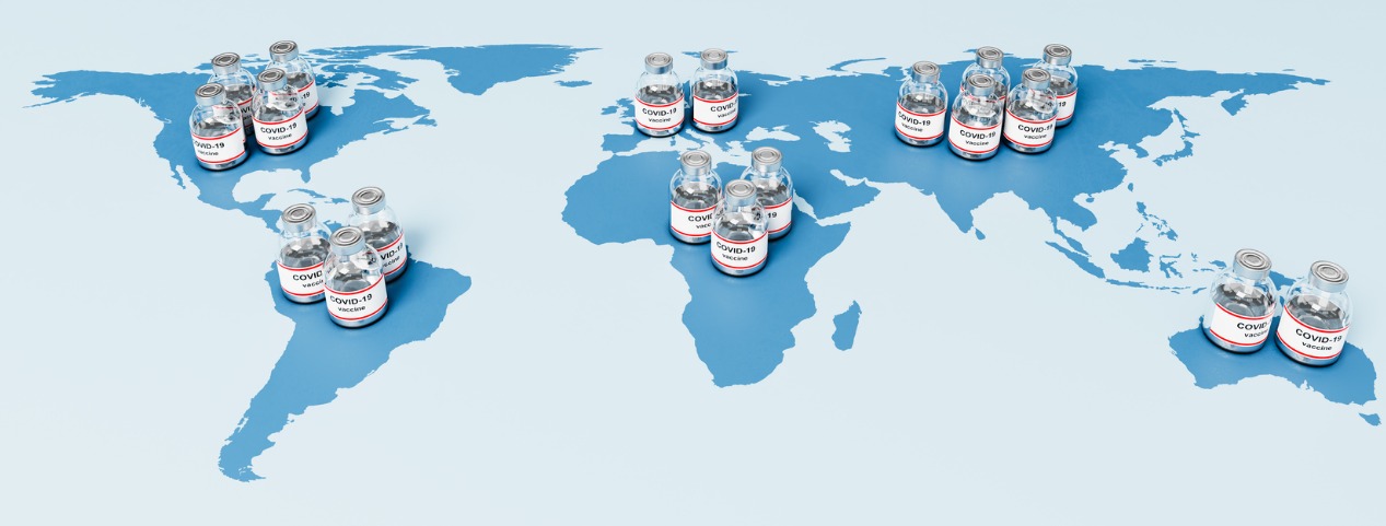 Covid Vaccine vials on top of world map